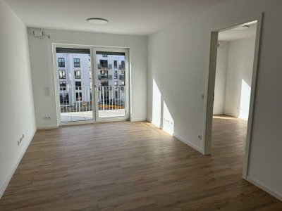 Erstbezug – attraktive 2-Zimmer-Wohnung mit Einbauküche, Dachterrasse und Parkhaus-Stellplatz