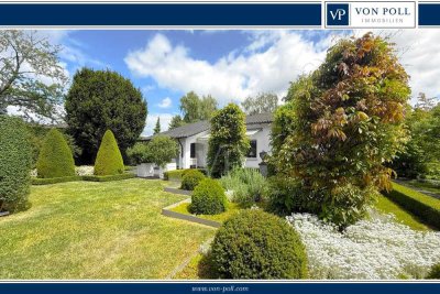 VON POLL - BAD HOMBURG: Großzügiger Bungalow mit Einliegerwohnung, parkähnlichem Garten und Garage
