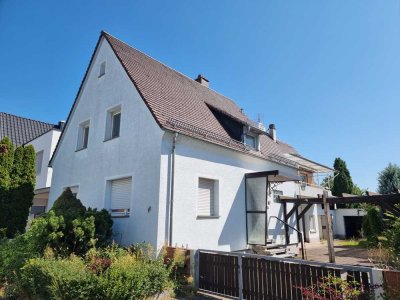 Zur Eigennutzung oder zur Teilvermietung: Ein- bis Zweifamilienhaus mit Garten und Garage