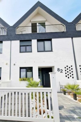 Attraktives Reihenhaus mit Kaltwintergarten, Balkon und Garage