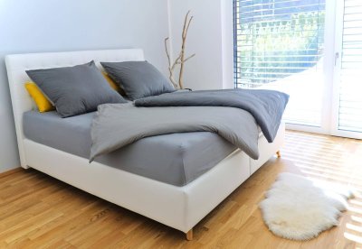 Provisionsfrei: Traumhafte Gartenwohnung (85 m² Garten) inkl. TG in Toplage Fieberbrunn