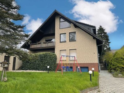 Einfamilienhaus mit ELW, großer Doppelgarage und Schwimmbad - mit Blick auf den Großen Weserbogen!