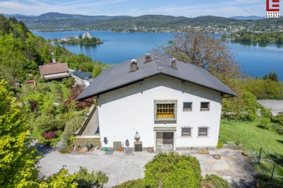 Panorama-Landhaus über der Bucht mit Badeplatz-Option &amp; Baulandreserve