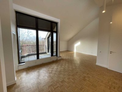 Exklusive 3-Zimmer-DG-Wohnung mit geh. Innenausstattung und 2 Balkonen