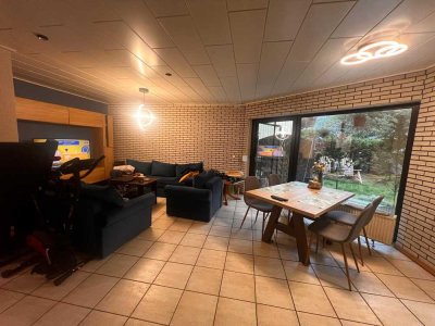 In Mainz-Laubenheim: Gepflegte Gartenwohnung mit drei Zimmern und Garagen