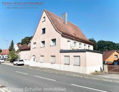 Vielseitiges Mehrfamilienhaus mit großem Potenzial in zentraler Lage
