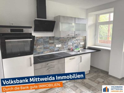 Ehemaliges Wohn- und Geschäftshaus im Zentrum der Stadt