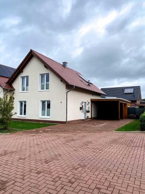 Doppelhaushälfte mit Terrasse, Carport und Gerätehaus in Molbergen