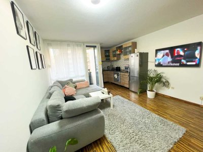 1 Zimmer Wohnung mit ruhigem Balkon, zentral und naturnah.