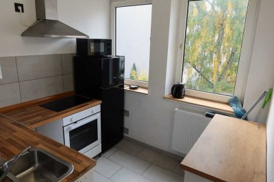 Modernisierte 2-Zimmerwohnung mit Balkon und Garage