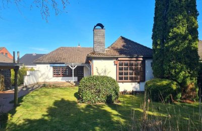 Charmanter Bungalow mit traumhaftem Garten in ruhiger Lage