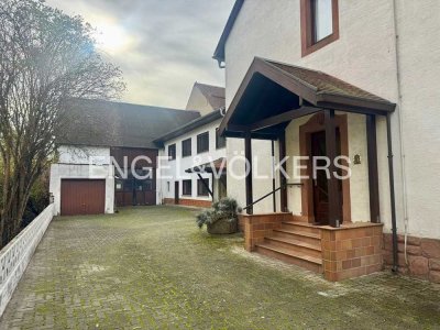 Anwesen mit zwei Wohnhäusern, Scheune und zusätzlichem Bebauungspotenzial in LU-Rheingönheim!