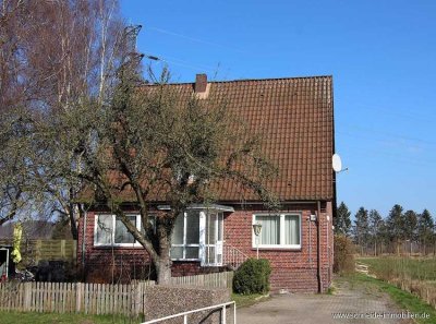 Vermietetes Zweifamilienhaus auf Erbpachtgrundstück in Altengamme