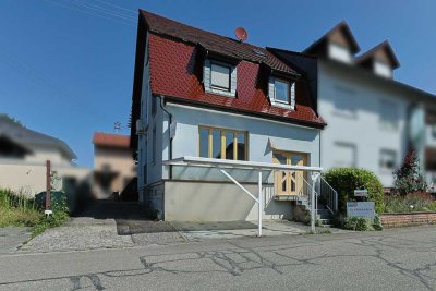 Charmante Doppelhaushälfte mit Einliegerwohnung – Ideal für Familien