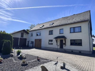 Zweifamilienhaus mit herrlichem Garten, großer Garage und viel Platz in Dommershausen-Dorweiler!