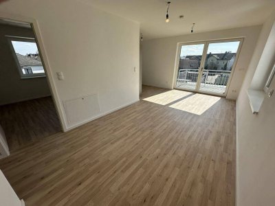 Neubau: Stilvolle Wohnung mit Balkon, Wärmepumpe &amp; Lift - Erstbezug!