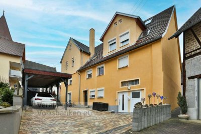 Charmantes Einfamilienhaus mit vermieteter Einliegerwohnung - Willkommen in Ihrer neuen Immobilie