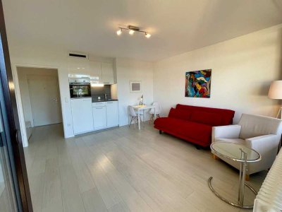 Exklusiv möblierte Wohnung mit Balkon & Grünblick in Schwabing – Leopoldstraße