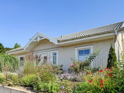 Exklusiver Schweden-Winkelbungalow – Stilvolles Wohnen auf einer Ebene