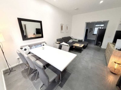 Einziehen und Wohlfühlen: Charmante Maisonette-Erdgeschosswohnung mit großer Terrasse in Mülfort