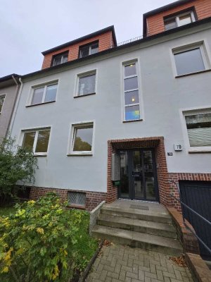 Sanierte 3 Zi.-Wohnung mit Terrasse und Gartennutzung.