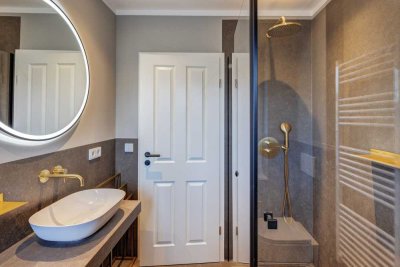 Erstbezug: Traumhaftes Design-Apartment in Nymphenburg mit großem Westbalkon