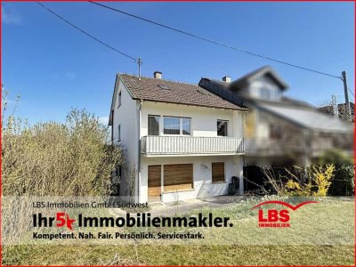 Gepflegte Doppelhaushälfte mit Einbauküche, Garage und sonnigem Garten