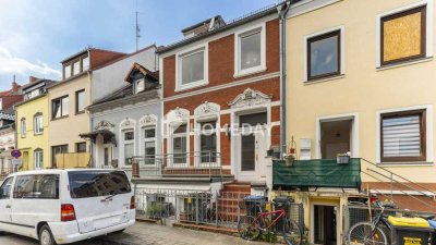 Zwei Einheiten, viele Möglichkeiten – Mehrfamilienhaus mit Garten und Teilvermietung
