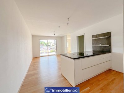 Modernes Wohnen in Grieskirchen – Neuwertige 4-Zimmer-Wohnung mit hochwertiger Küche - Balkon und Gartennutzung