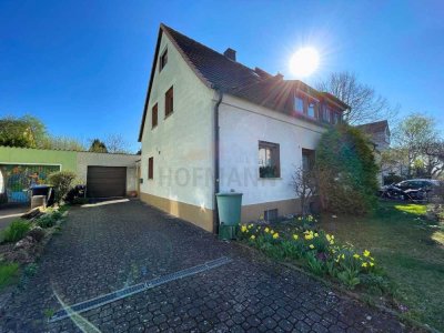 Gepflegte Doppelhaushälfte in Niederwerrn mit schönem Garten und Nebengebäuden