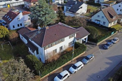 Exklusive Stadtvilla mit großzügigem Grundstück, Garten mit Teich & Garage in TOP-Lage