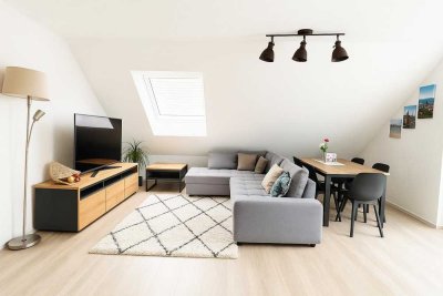 Exklusiv ausgestattete 4,5-Zimmer-Dachgeschosswohnung NEUBAU mit sonnigem Balkon