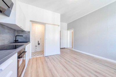 Frisch renoviert: Wohntraum mit neuer Einbauküche und schönem Bad in top zentraler Lage
