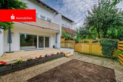 Bad Homburg: Reihenmittelhaus - Raumwunder mit kleinem Garten und 2 Stellplätzen