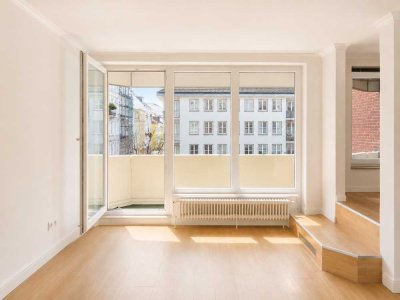 Urban wohnen in St. Georg: Vermietete 1-Zimmer-Wohnung mit Sonnenbalkon an der Langen Reihe
