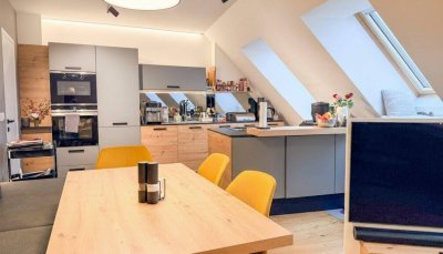 Traumwohnung mit 40 m² Dachterrassen, 2 Garagenplätzen, E-Ladestation und Topausstattung