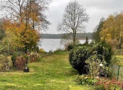 Wohnen mit Seeblick: 4-Zimmer-Terrassenwohnung mit gehobener Innenausstattung mit EBK in Stechlin