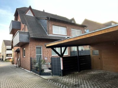 Maisonette-Eigentumswohnung im Erdgeschoss und Souterrain mit Terrasse und eigenem Eingang