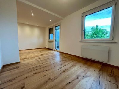 Generalsanierte Wohnung mit Tischlerküche und Südbalkon – Erstbezug in Wals-Viehhausen