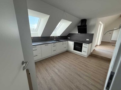 Erstbezug: Helle Dachgeschosswohnung mit Loggia & Einbauküche in Oberndorf – 69 m² Wohlfühlraum