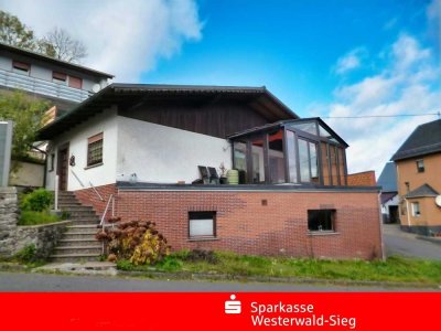 Bungalow, voll unterkellert, mit Wintergarten, Balkon, Sauna und Panoramablick.