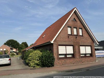 solides Klinkergebäude mit Garage und Wintergarten in Apen