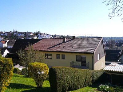 Mehrfamilienhaus mit 8 Garagenstellplätzen, Werkstatt und Lager in ruhiger Lage von Oberboihingen