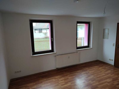 Erdgeschosswohnung in Mehrfamilienhaus