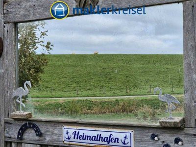 Wohnen direkt am Deich: Urige Dachgeschosswohnung zur Miete!