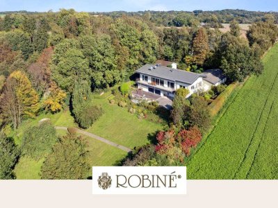 Refugium mit Weitblick – Haus mit Einliegerwohnung in Düsseldorfer Naturlage