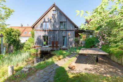 Wie verzaubert! Gemütliches, kleines Einfamilienhaus mit traumhaftem Garten