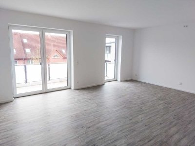 Neubau: Exklusive 3-Zi.-Whg. (ca. 79,88 m²) mit Balkon + TG-Stellplatz in zentraler Wohnlage