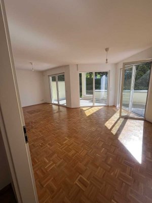 Hochwertige Erdgeschosswohnung mit eigenem Garten