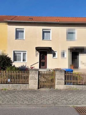 Charmantes Reihenmittelhaus mit Garten, 2 Garagen und Wintergarten in ruhiger Lage von Braunsbedra